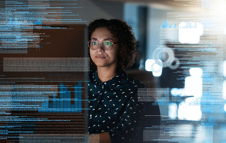 A woman analyses data.